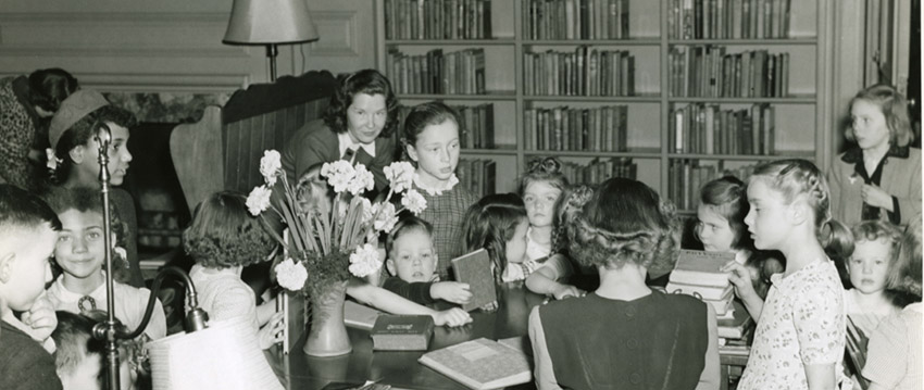 Historical photo of children in library